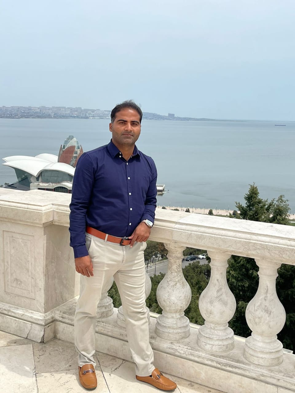 Dr. Zaheer Khalid with dairy cattle and livestock